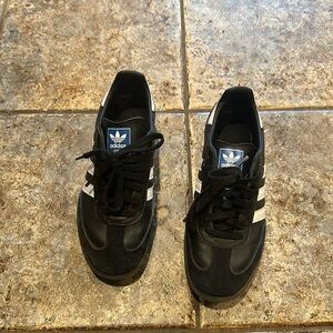 Women’s black adidas sambas